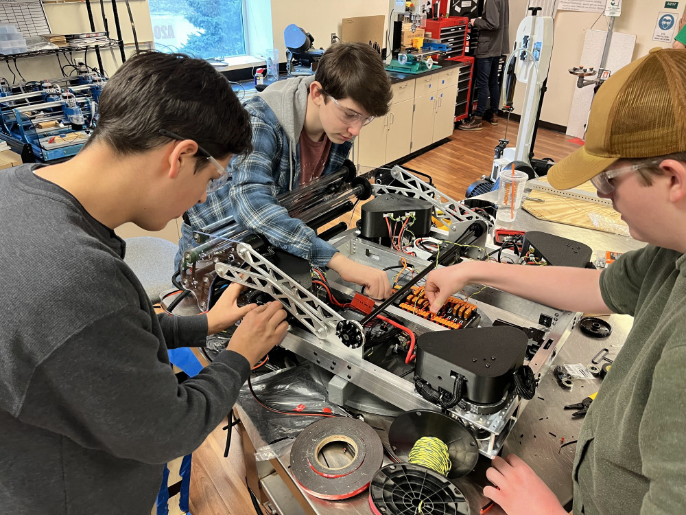 Students working on a robot