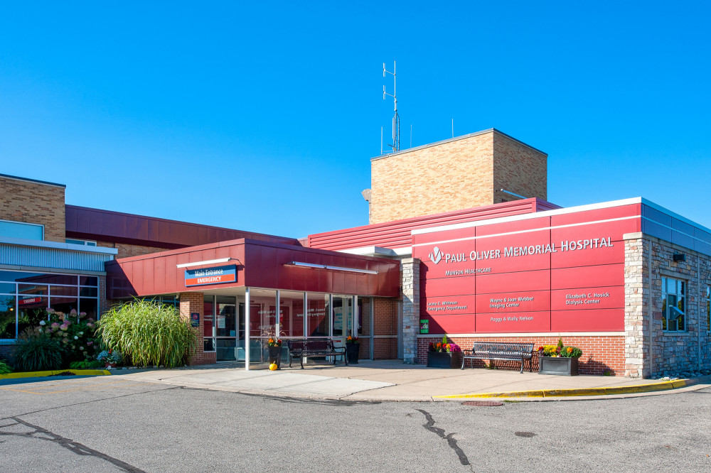 Brick exterior and red paneling of Paul Oliver Memorial Hospital