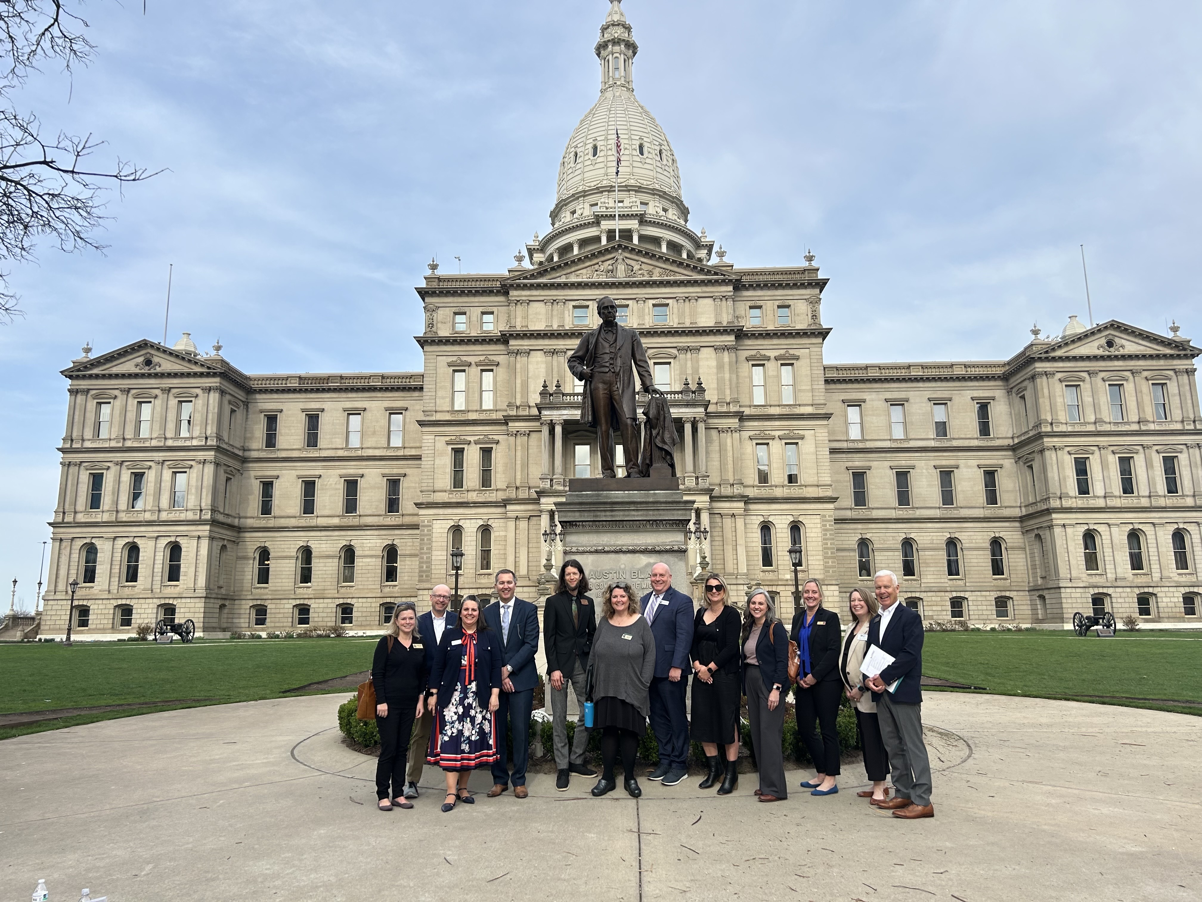 Community Development Coalition members from leaders across the region together at the Lansing Capitol