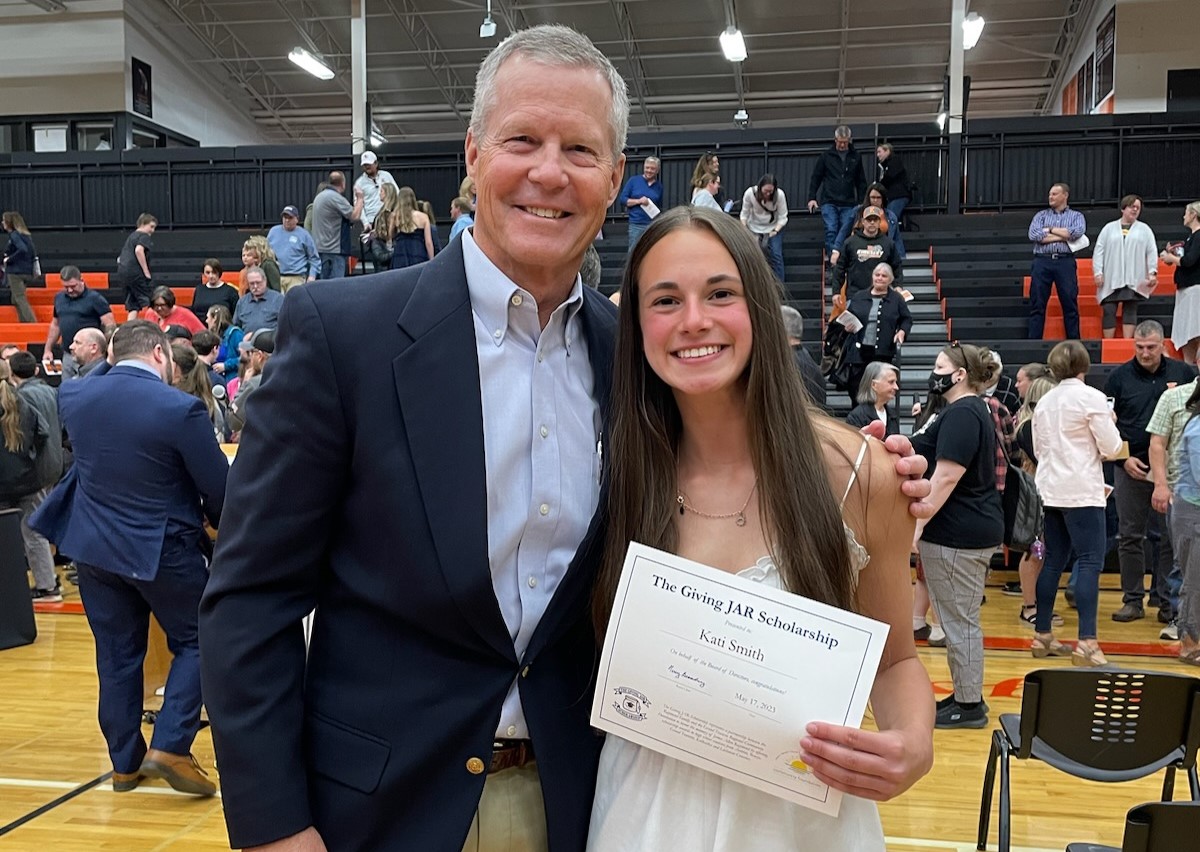 2023 Giving JAR Scholarship award winner, Kati Smith from Kingsley High School with Tom Raymond